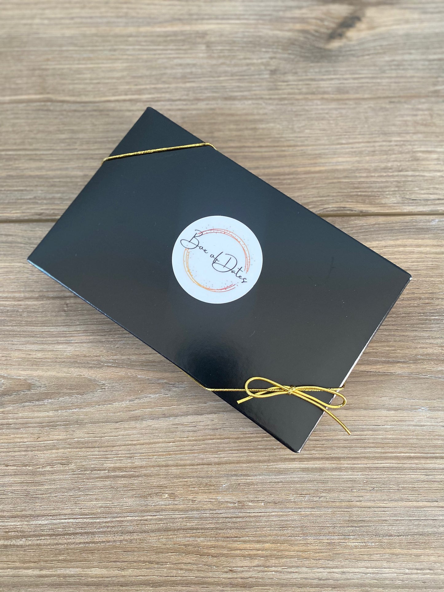 Peanut butter chocolate Medjool dates gift box with ribbon